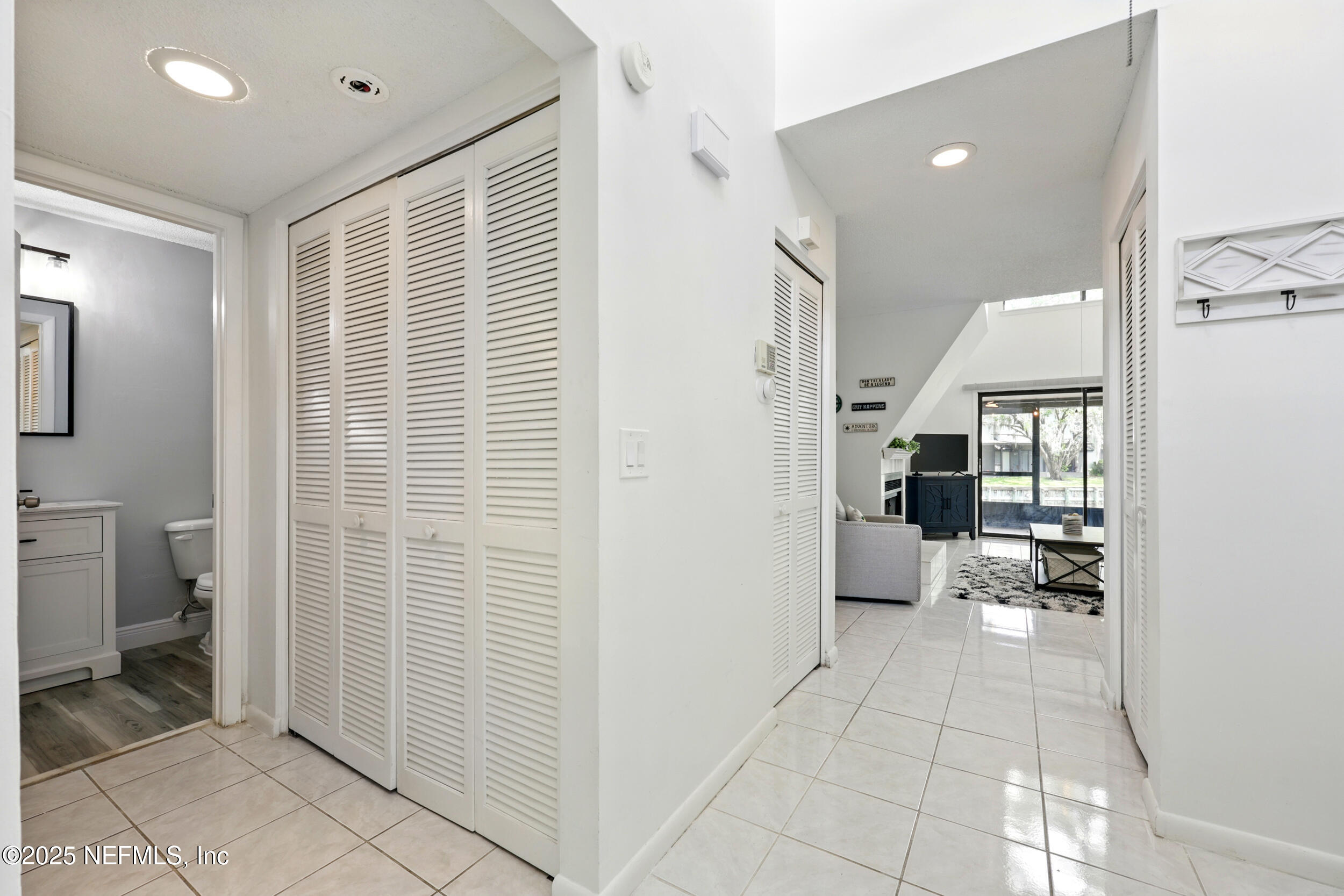 9360 Craven Road, Unit 1406 Jacksonville, FL 32257 - Photo 10 of 30 a view of a bathroom with a sink and a toilet