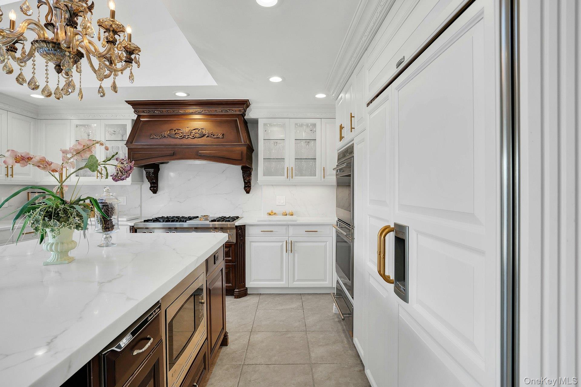 10 Beech Road Islip, NY 11751 - Photo 18 of 49 a kitchen with a refrigerator and a stove