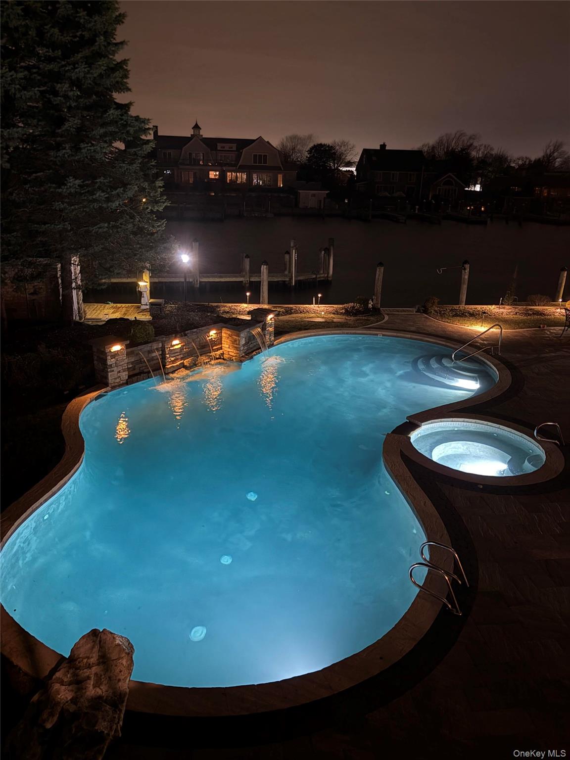 10 Beech Road Islip, NY 11751 - Photo 48 of 49 a view of a swimming pool with seating space