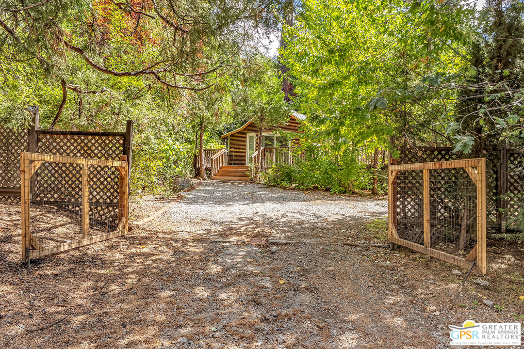 25300 Tahquitz Road Idyllwild, CA 92549 - Photo 46 of 75 a view of backyard with wooden fence