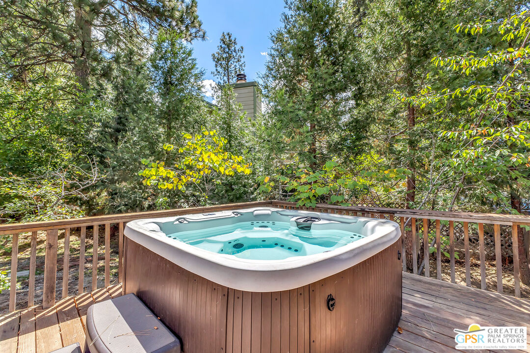 25300 Tahquitz Road Idyllwild, CA 92549 - Photo 55 of 75 a view of outdoor sitting area with swimming pool and trees in the background