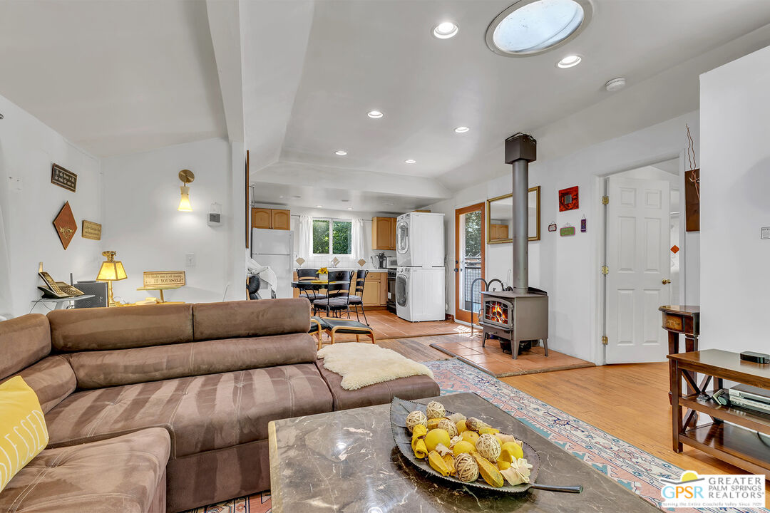 25300 Tahquitz Road Idyllwild, CA 92549 - Photo 63 of 75 a living room with furniture and a wooden floor