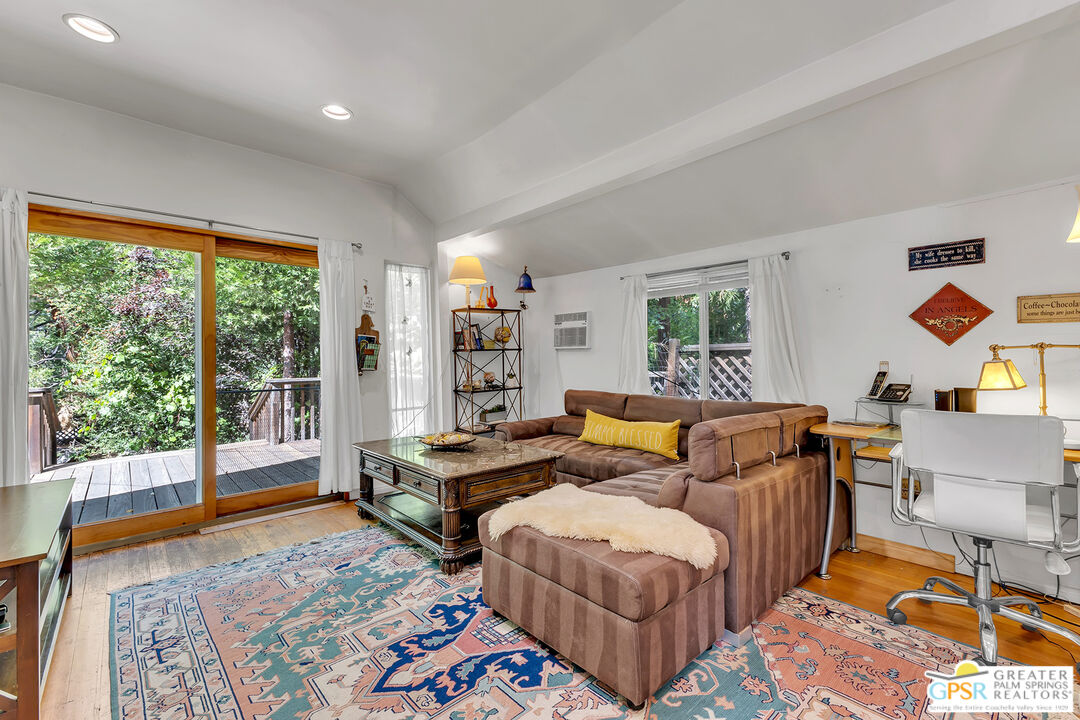 25300 Tahquitz Road Idyllwild, CA 92549 - Photo 64 of 75 a living room with furniture and a large window