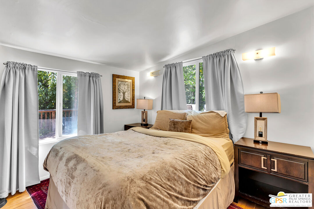 25300 Tahquitz Road Idyllwild, CA 92549 - Photo 75 of 75 a bedroom with a bed and a night stand