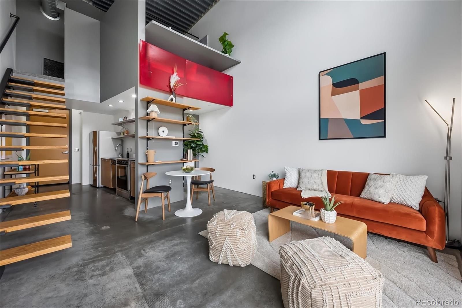 a living room with furniture and a couch