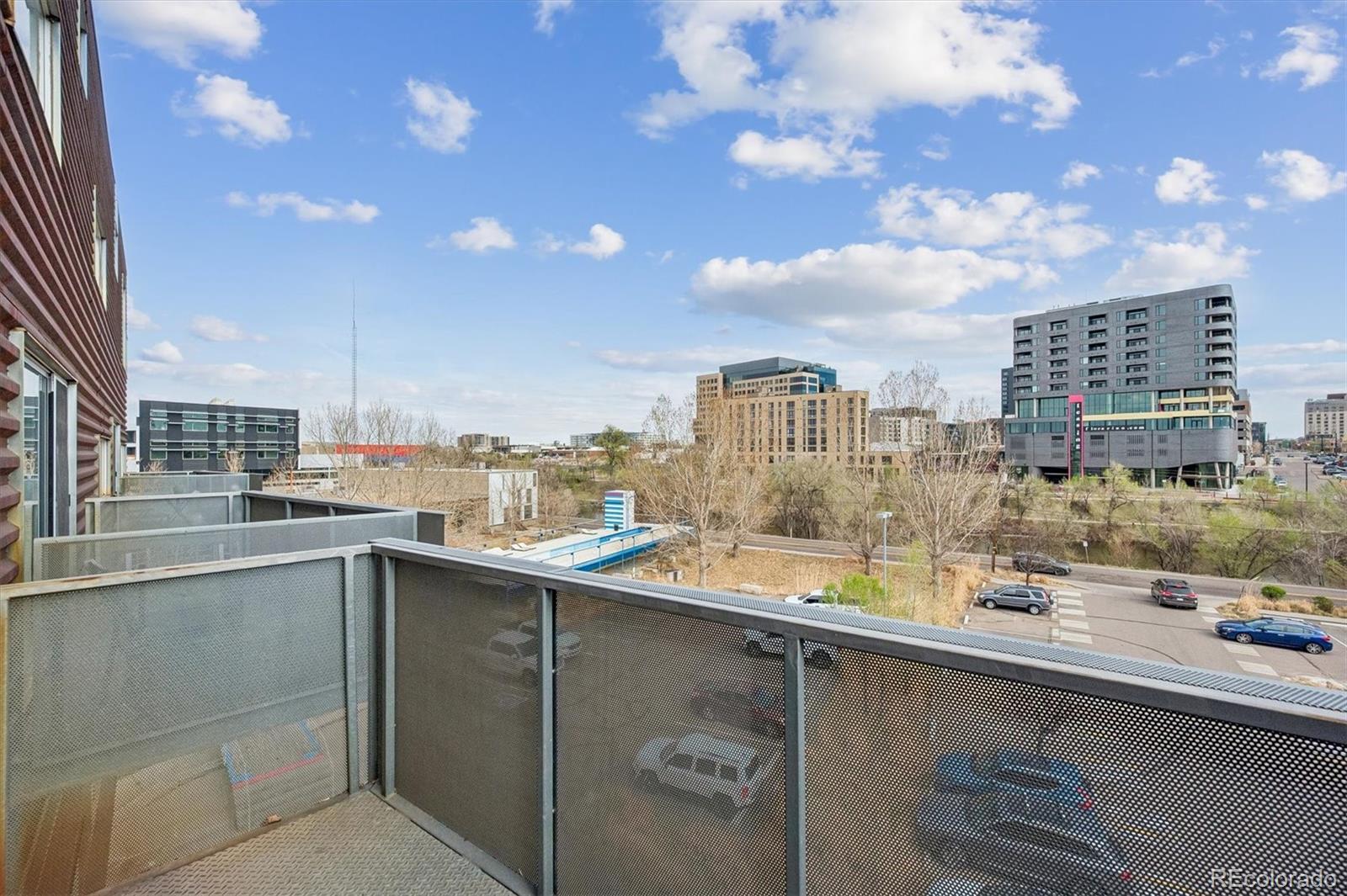 3457 Ringsby Court, Unit 347 Denver, CO 80216 - Photo 18 of 22 a picture of city view