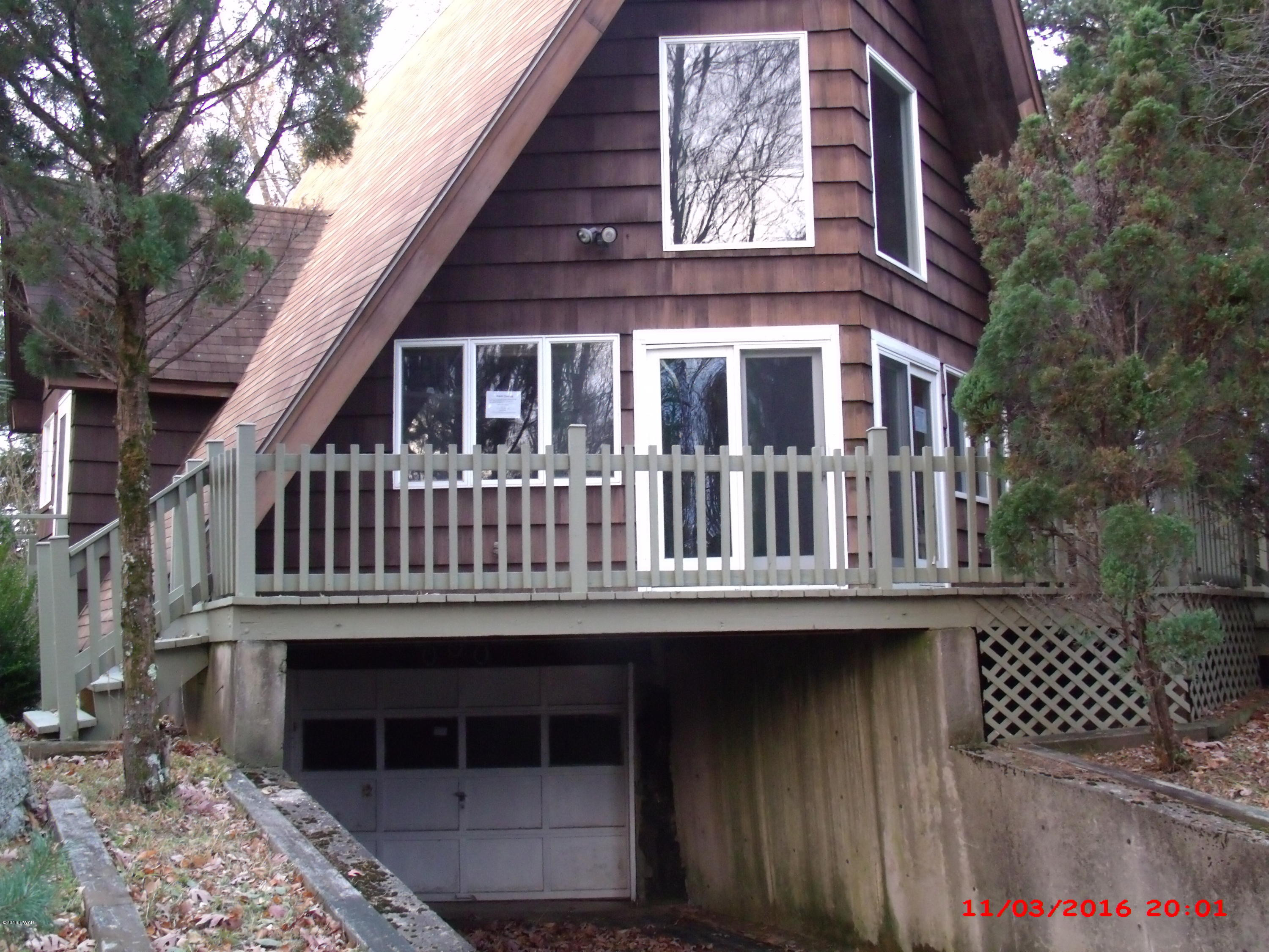 397 Perkins Pond Road Beach Lake, PA 18405 - Photo 3 of 25 a view of a house with a porch