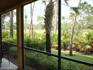 21743 Sound Way, Unit 101 Estero, FL 33928 - Photo 8 of 8 a view of outdoor with green space
