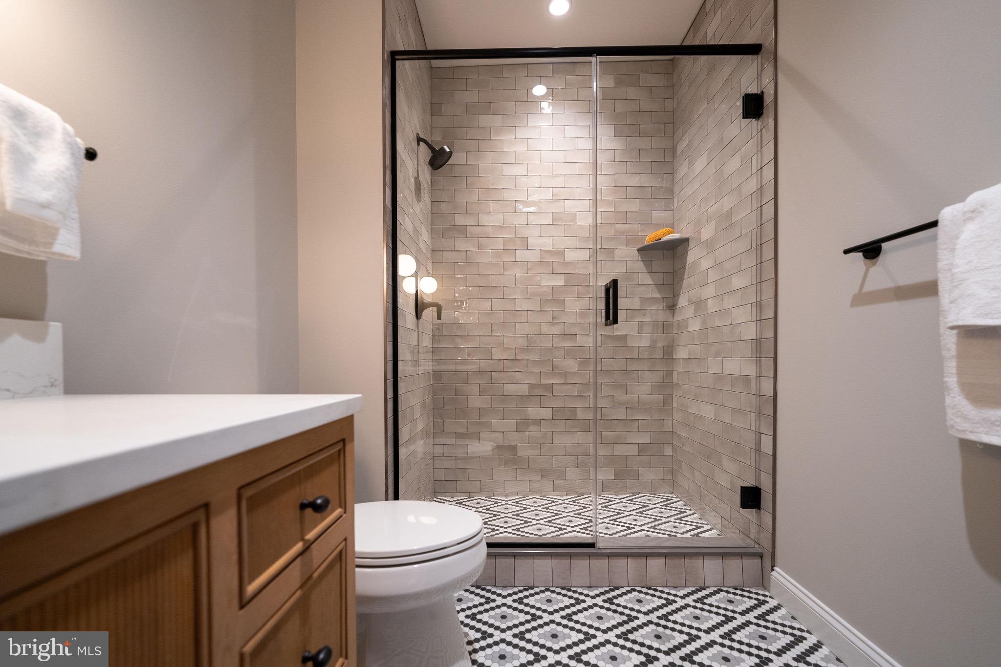 200 South Broad Street, Unit 314 Philadelphia, PA 19102 - Photo 14 of 46 a bathroom with a shower toilet and sink