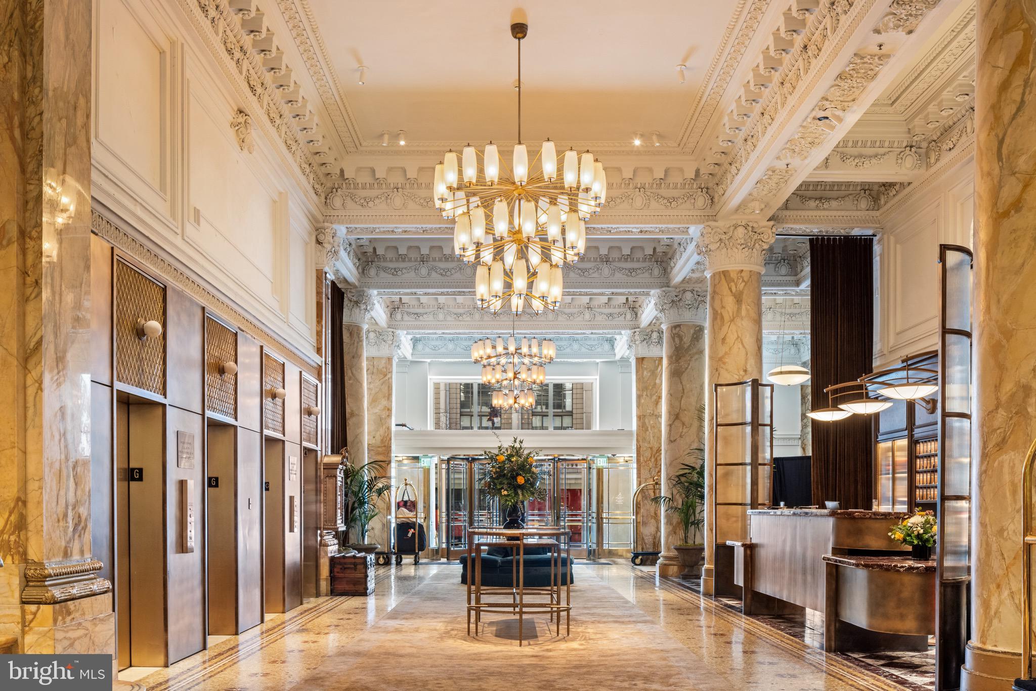 200 South Broad Street, Unit 314 Philadelphia, PA 19102 - Photo 20 of 46 a view of a lobby with furniture and chandelier