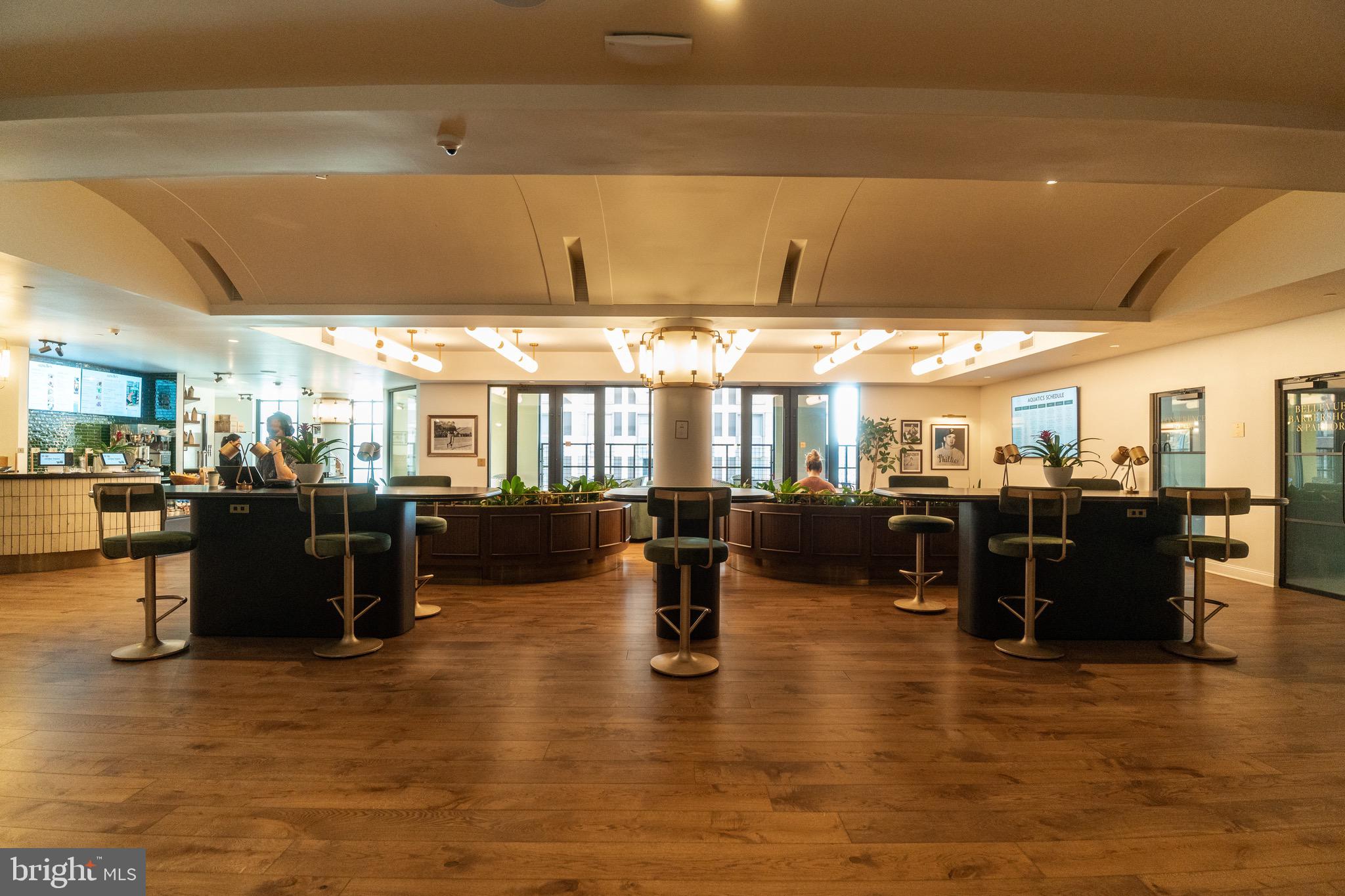 200 South Broad Street, Unit 314 Philadelphia, PA 19102 - Photo 26 of 46 a living room with lots of furniture and black countertop