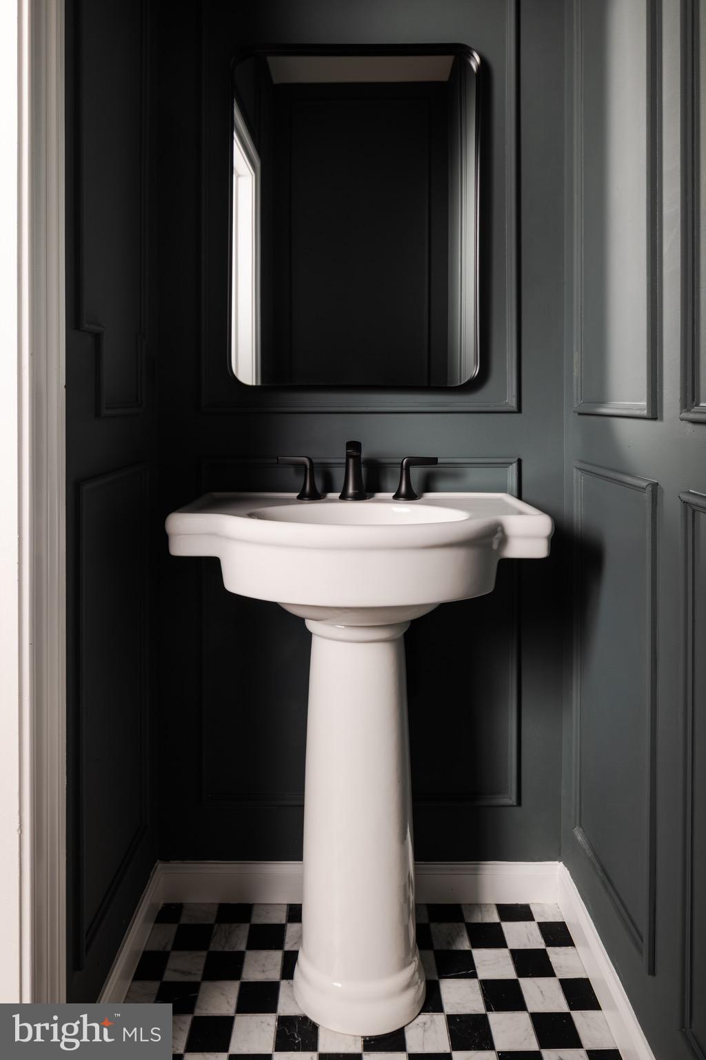 200 South Broad Street, Unit 314 Philadelphia, PA 19102 - Photo 5 of 46 a bathroom with a sink and a mirror