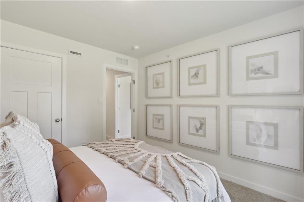 158 River Rdg Drive Coraopolis, PA 15108 - Photo 10 of 17 a bedroom with a bed and a painting on the wall