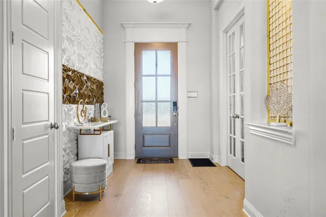 a bathroom with a toilet tub and a window