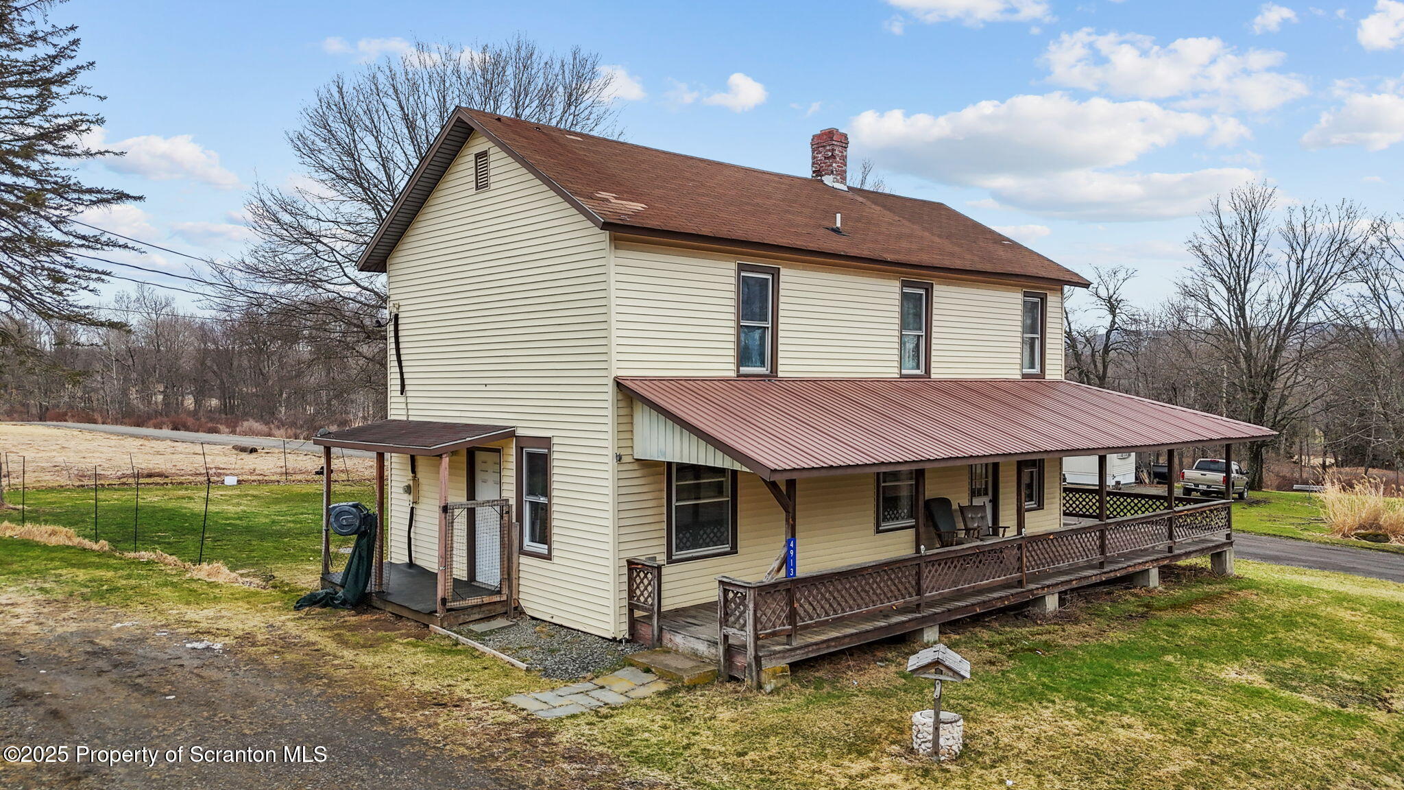 4913 Fiddle Lake Road Thompson, PA 18465 - Photo 1 of 28 Front