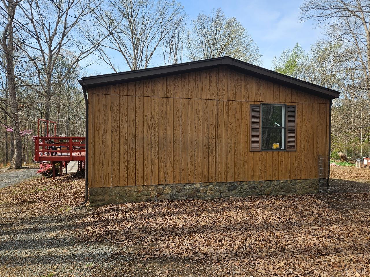 413 Plum Branch Road Lynchburg, VA 24504 - Photo 18 of 22 a view of a house with a yard