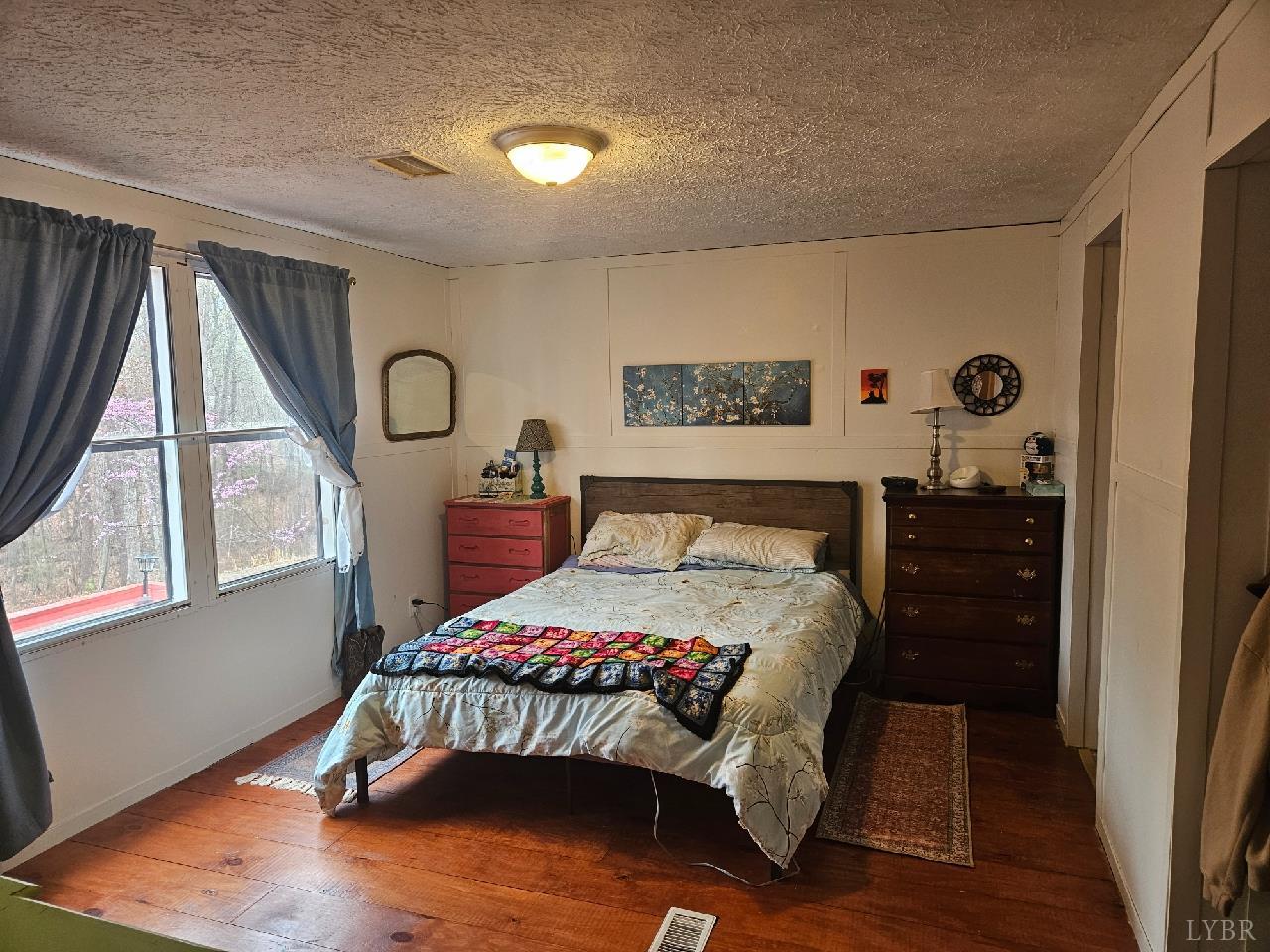 413 Plum Branch Road Lynchburg, VA 24504 - Photo 7 of 22 a bedroom with a bed and window