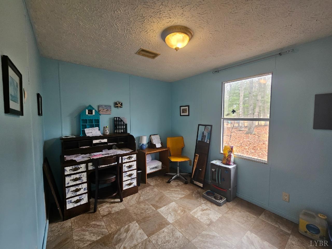 413 Plum Branch Road Lynchburg, VA 24504 - Photo 10 of 22 a view of a workspace with furniture and a window
