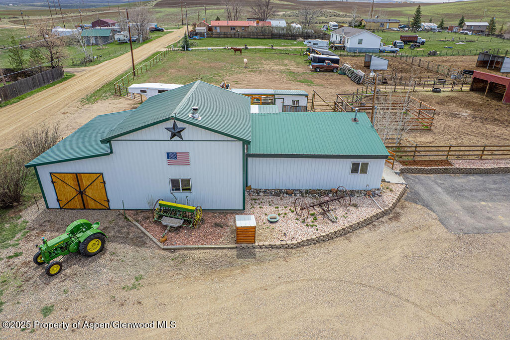 1020 Thompson Way Craig, CO 81625 - Photo 2 of 92 an aerial view of a house with a yard