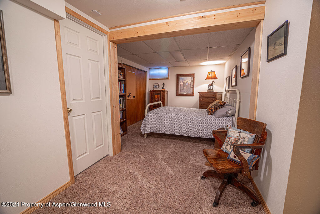 1020 Thompson Way Craig, CO 81625 - Photo 37 of 92 a bedroom with furniture and a window