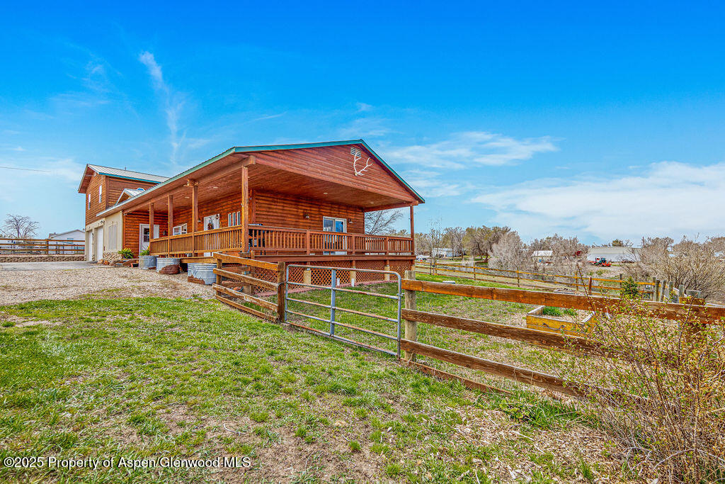 1020 Thompson Way Craig, CO 81625 - Photo 4 of 92 a view of a house with a yard