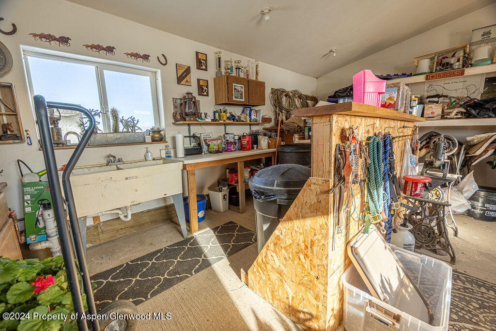 1020 Thompson Way Craig, CO 81625 - Photo 41 of 92 a view of walk in closet with clothes and shoes