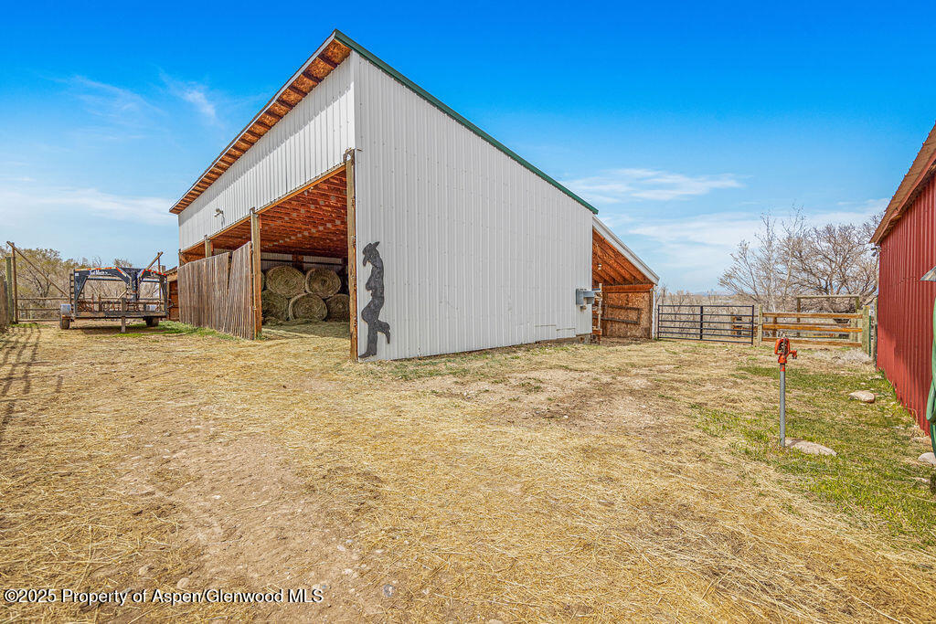1020 Thompson Way Craig, CO 81625 - Photo 69 of 92 a view of a backyard of a house with a garage