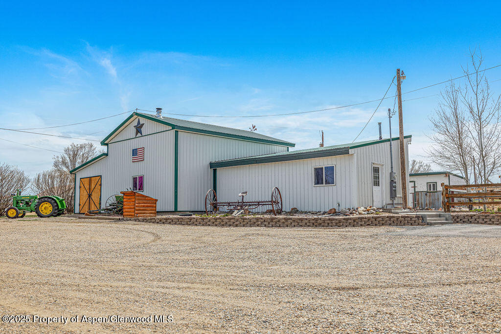 1020 Thompson Way Craig, CO 81625 - Photo 86 of 92 a view of a house with snow on the road