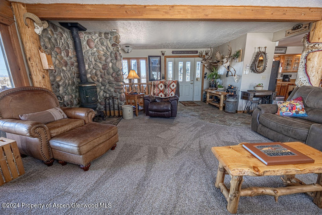 1020 Thompson Way Craig, CO 81625 - Photo 10 of 92 a living room with furniture and a couch