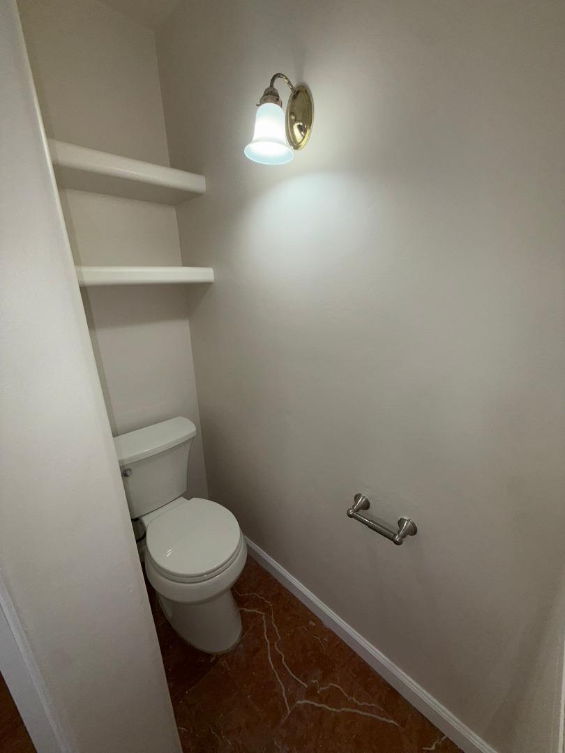 11585 McCarthy Road Carmel Valley, CA 93924 - Photo 33 of 52 a white toilet sitting next to a shower