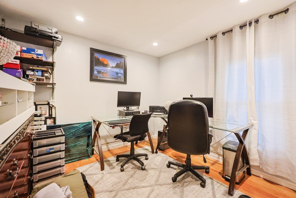 7 Jackson Court, Unit B Natick, MA 01760 - Photo 13 of 28 a view of a workspace with furniture and a window