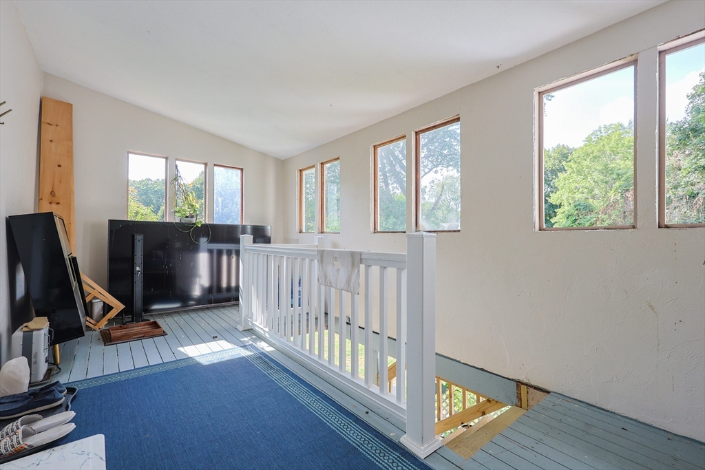 7 Jackson Court, Unit B Natick, MA 01760 - Photo 24 of 28 a view of a room with gym equipment