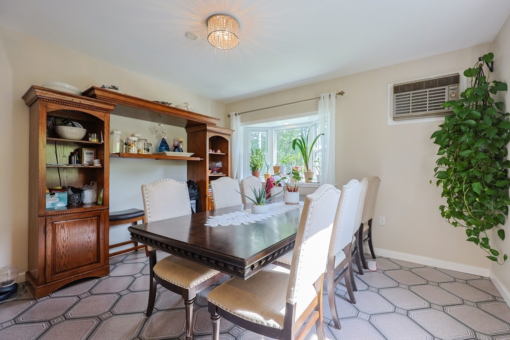 7 Jackson Court, Unit B Natick, MA 01760 - Photo 6 of 28 a dining room with furniture and window
