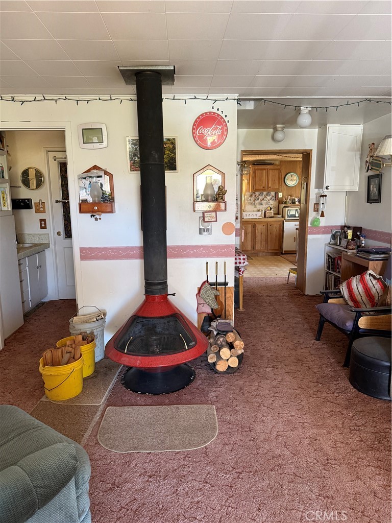 97940 Deodar Road Kennedy Meadows, CA 93527 - Photo 4 of 21 a living room with furniture and a table