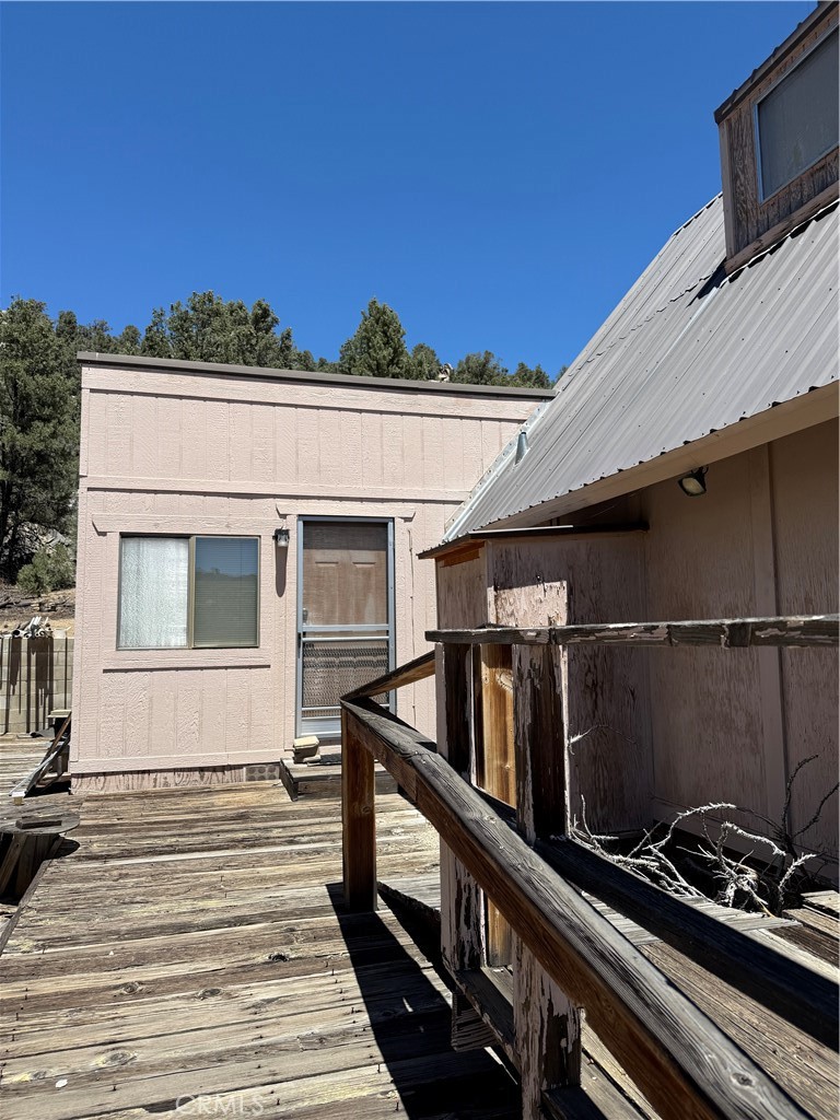 97940 Deodar Road Kennedy Meadows, CA 93527 - Photo 6 of 21 a view of a house with a balcony