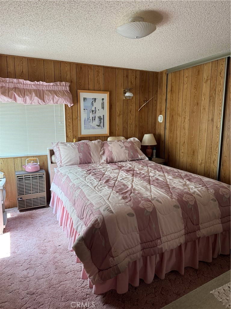 97940 Deodar Road Kennedy Meadows, CA 93527 - Photo 7 of 21 a bedroom with a bed and a cabinets