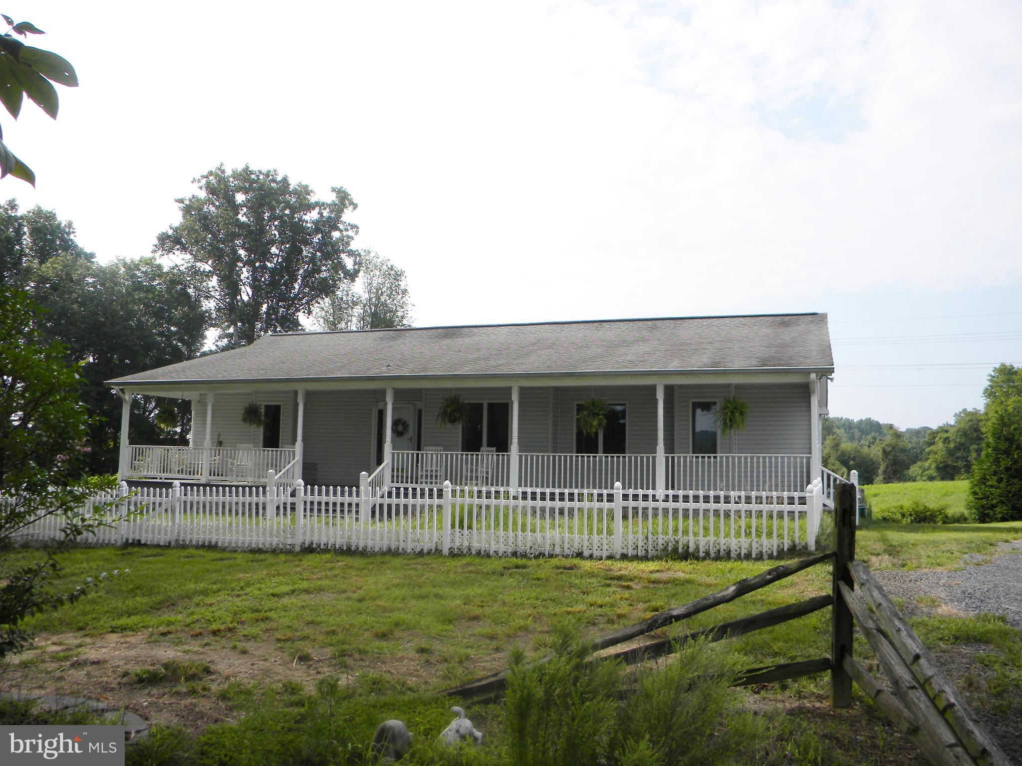 10767 Cliff Mills Road Marshall, VA 20115 - Photo 1 of 30 Landscaped front yard w/ fenced area off porch