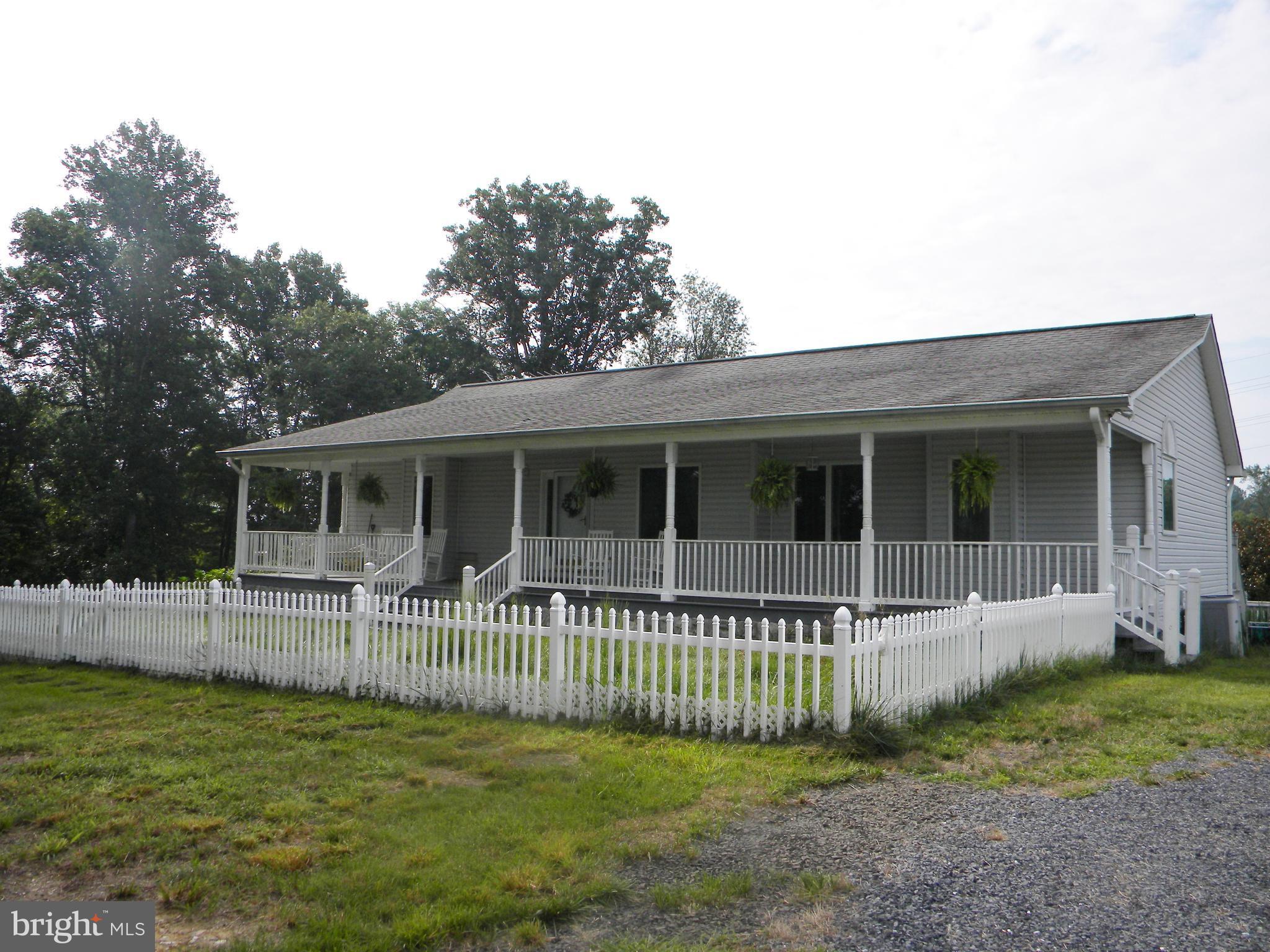 10767 Cliff Mills Road Marshall, VA 20115 - Photo 2 of 30 Front fenced area for dogs or kids off porch