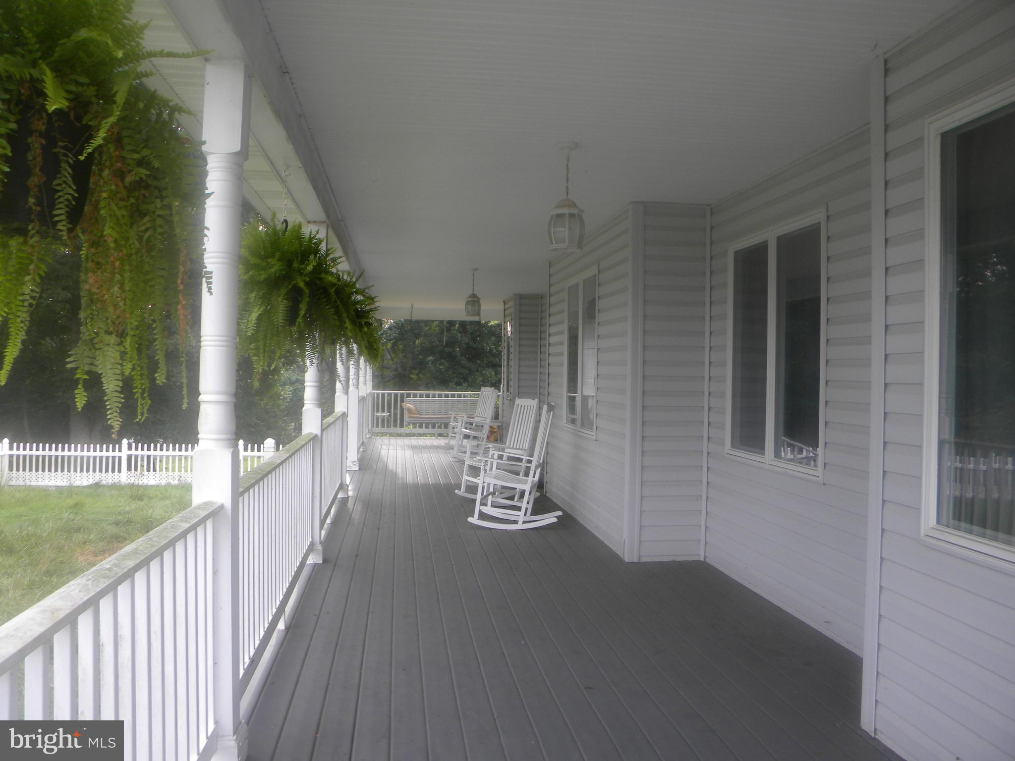 10767 Cliff Mills Road Marshall, VA 20115 - Photo 3 of 30 View of front porch with swing