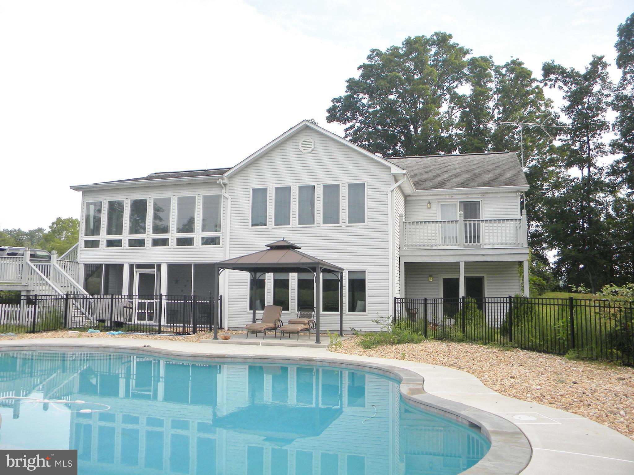 10767 Cliff Mills Road Marshall, VA 20115 - Photo 29 of 30 View of backside of house w/ pool & grill area