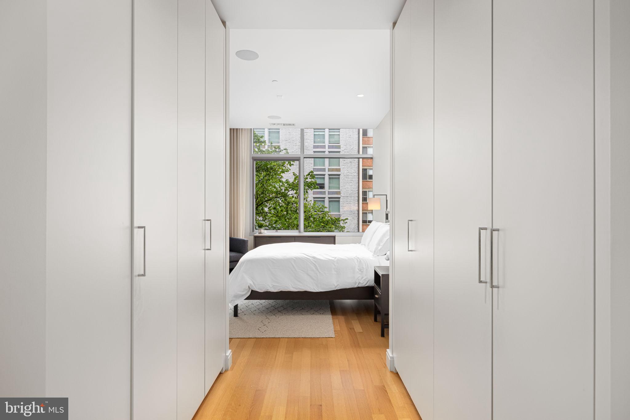 1177 22nd Street Northwest, Unit 4F Washington, DC 20037 - Photo 11 of 20 Primary bedroom custom closet system