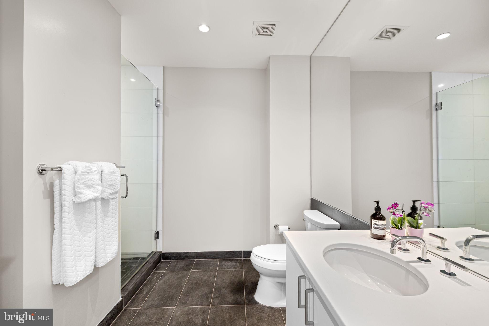 1177 22nd Street Northwest, Unit 4F Washington, DC 20037 - Photo 13 of 20 2nd Full bathroom with standing shower