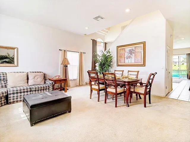 a view of a livingroom with furniture and window