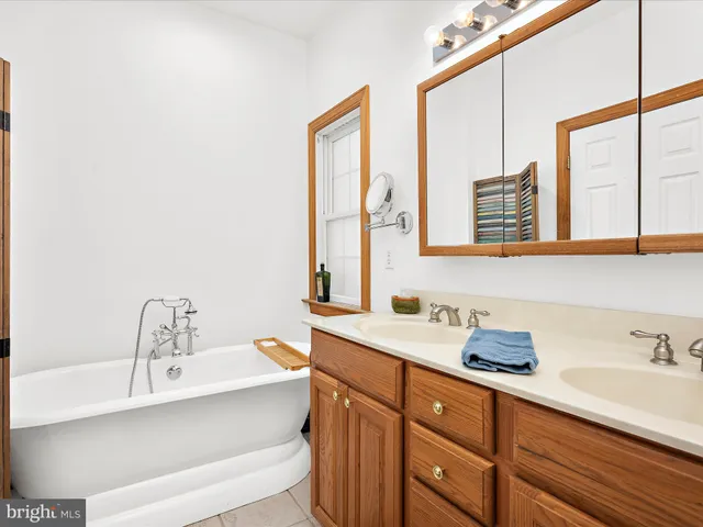 a bathroom with a sink and a bathtub