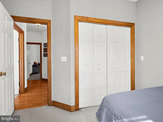 a view of a bedroom from a hallway