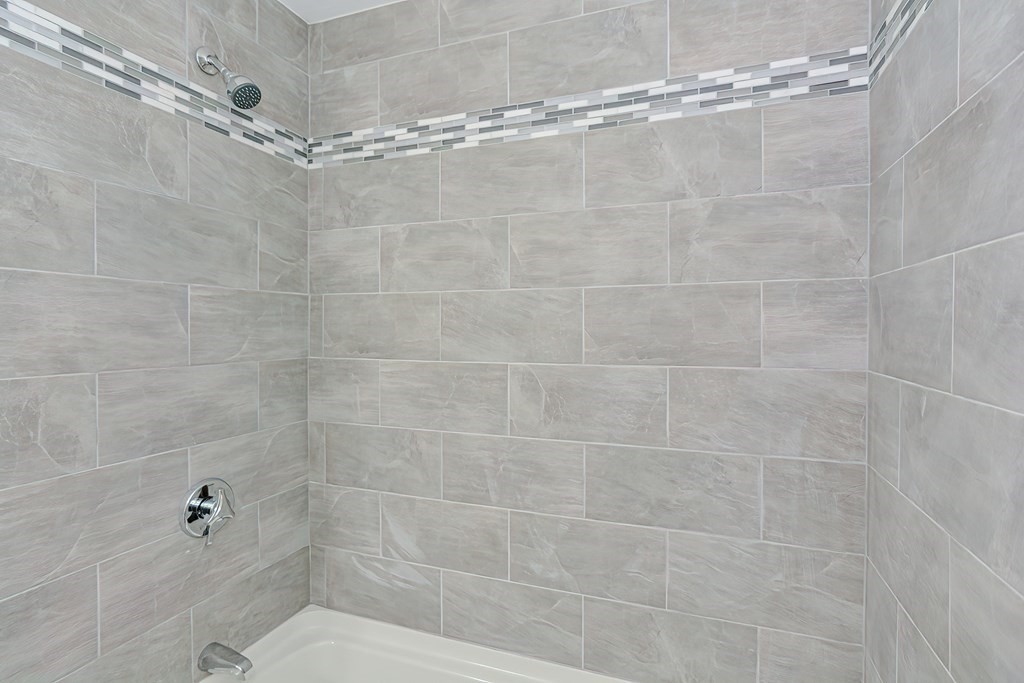 31 Clarkson Drive Walpole, MA 02081 - Photo 12 of 36 a bathroom with a shower