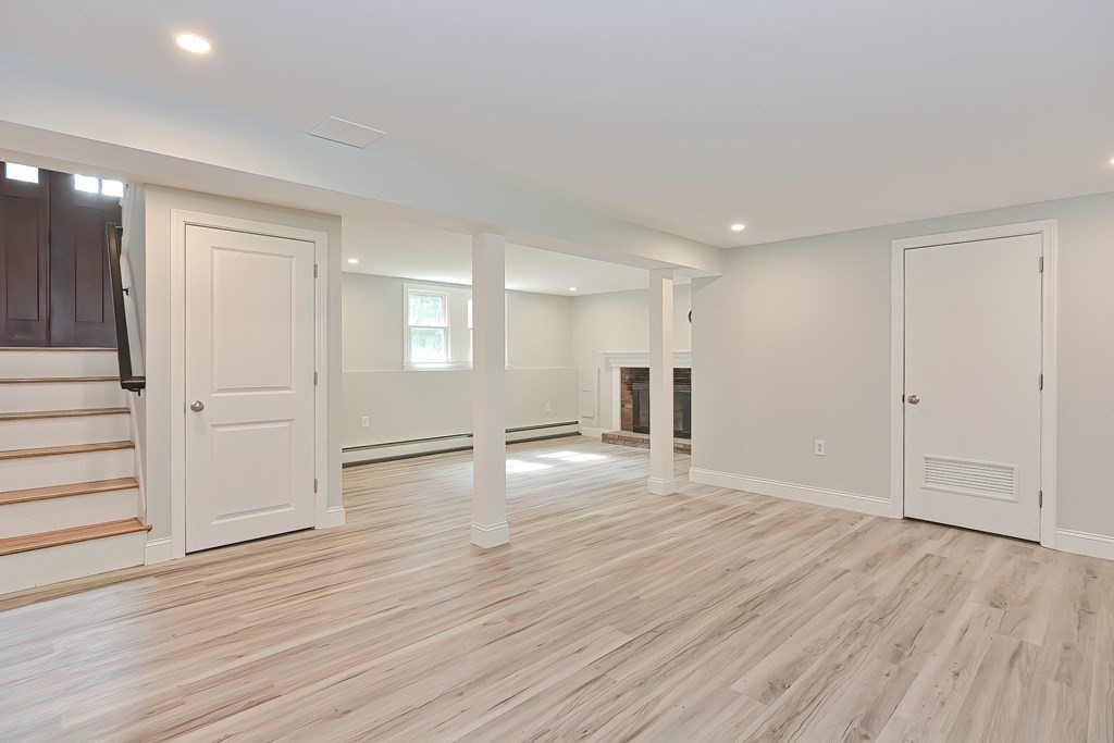 31 Clarkson Drive Walpole, MA 02081 - Photo 23 of 36 a view of empty room with wooden floor