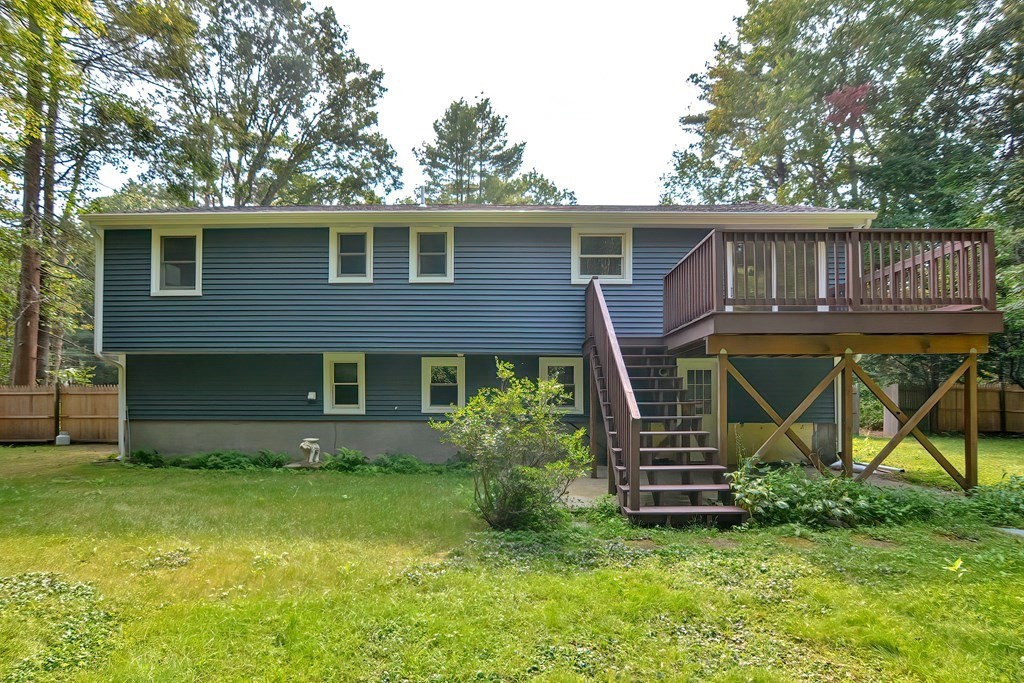 31 Clarkson Drive Walpole, MA 02081 - Photo 31 of 36 a front view of a house with garden