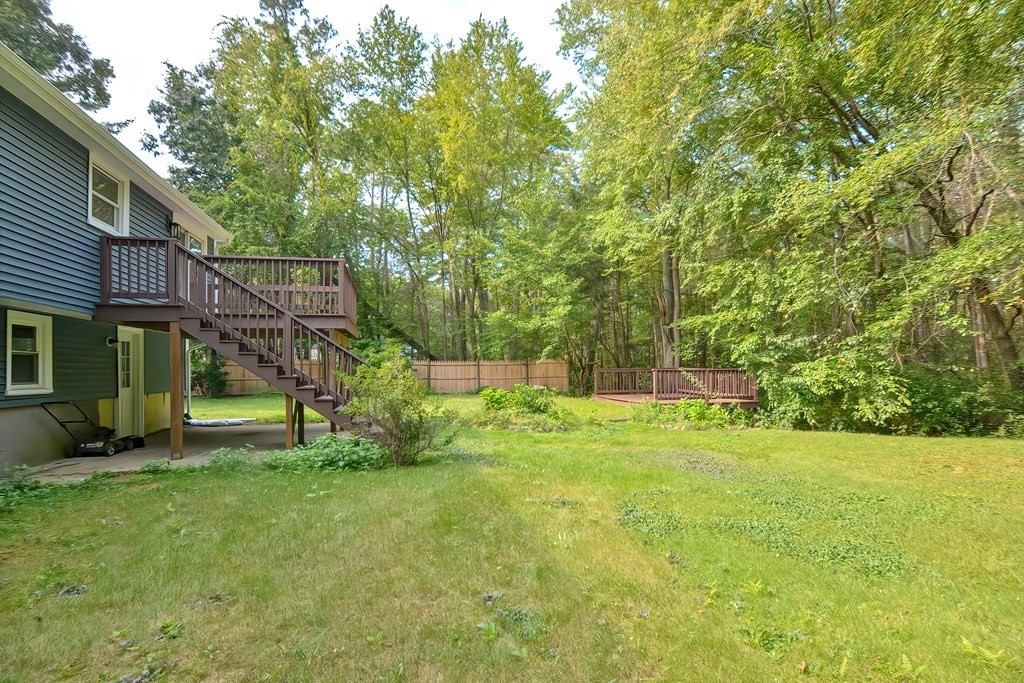 31 Clarkson Drive Walpole, MA 02081 - Photo 32 of 36 a view of a backyard with small cabin