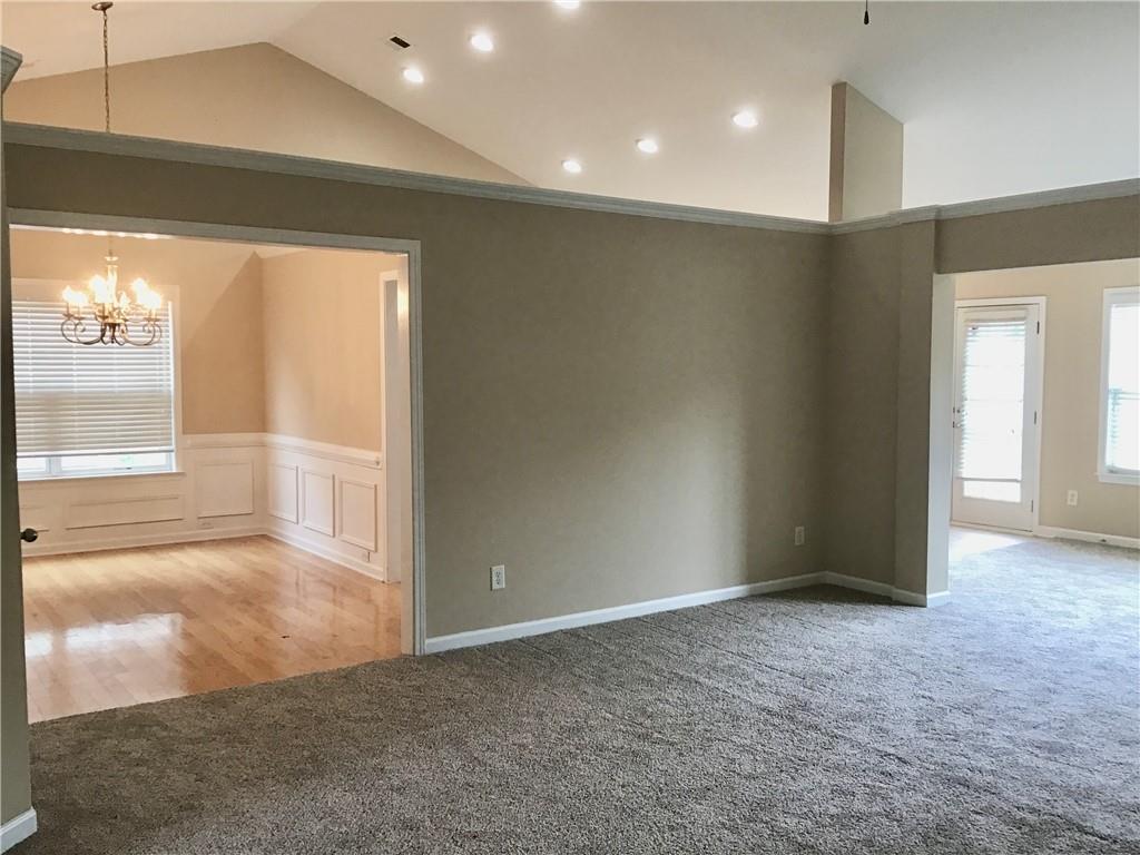 1052 South Creek Drive Villa Rica, GA 30180 - Photo 1 of 1 a view of an empty room with a window